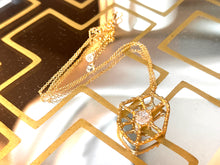 Load image into Gallery viewer, Intricate Spider Web in Brass with Clear Quartz