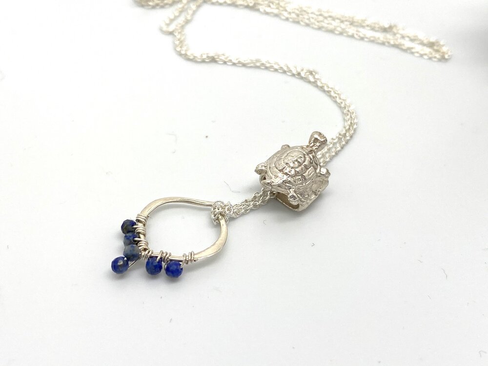 Traveling Silver Turtle Necklace on Romantic Teardrop with Wire Wrapped Lapis