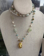 Long Green tonal Necklace with mini pine cone